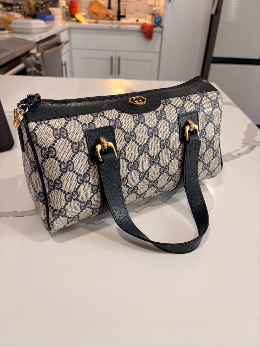 Gucci  GG Canvas Mini Bag in off white monogram with Navy Blue Leather Trim
